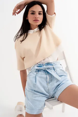 Denim shorts with light blue wash and waist tie